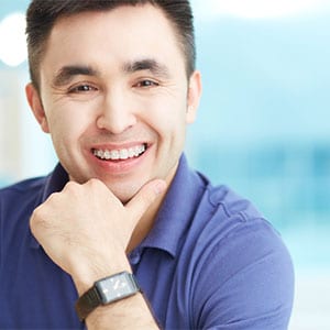 adult man smiling with braces